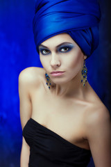 Eastern stylish girl with a turban on his head