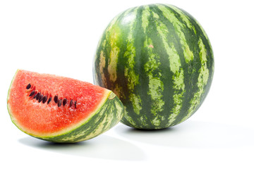 Melon whole and pieces, isolated on white