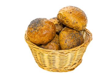 Baking in a wicker bread bins on white background