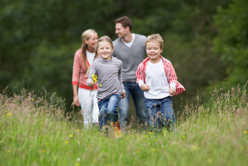 Fototapeta premium Family On Walk In Countryside
