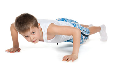 Training young athletic boy