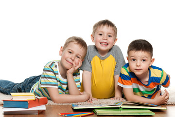 Boys reading on the floor