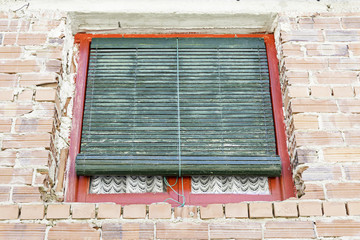 Closed window with blind