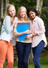 Group Of Female Teenage Students Outdoors
