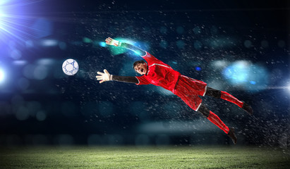 Goalkeeper catches the ball