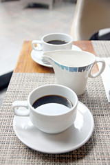 White Coffee cup on the table.