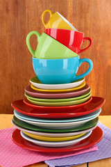 Mountain colorful dishes on napkin on wooden background