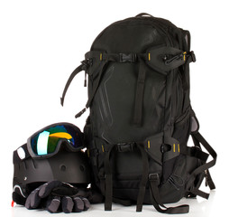 Winter sport glasses, helmet and gloves, backpack, isolated