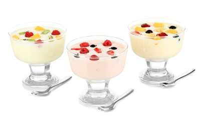 Delicious yogurt with fruit isolated on white