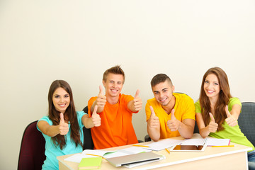 Group of young students sitting in the room