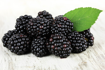 Sweet blackberries on table close-up