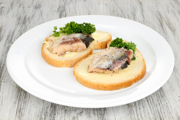 Tasty sandwiches with scomber, close-up