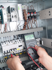 Engineer makes maintenance of power network automation