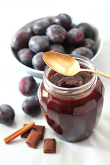 Plum jam with chocolate and cinnamon