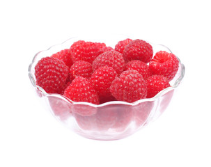 raspberries in small glass bowl
