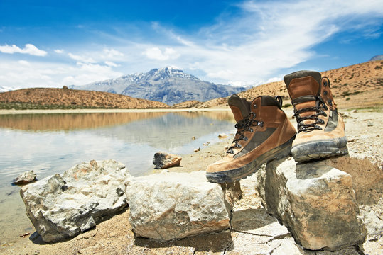 Tourist hiker boots shoes in mountains