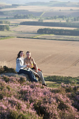 Couple Stopping For Lunch On Countryside Walk