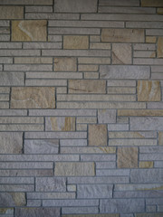 Multi-colored brick background, neutrals