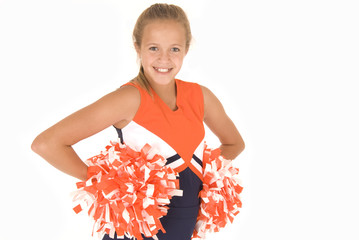 Young girl cheerleader standing with pompoms © sixdays