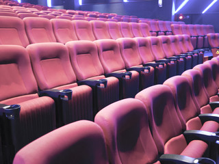 Red seats of cinema hall