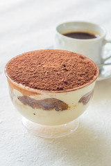 A cup of Tiramisu (with black coffee)
