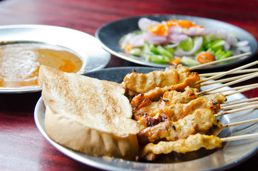 Pork satay with sauce , Thai style food.
