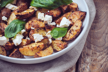 Homemade lunch: baked potato with soft cheese