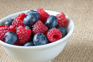white bowl with fresh berries