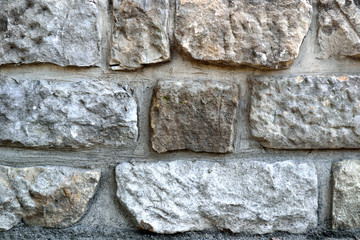 Wall built of rough stone