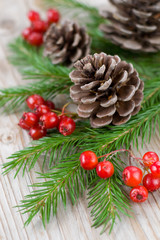 Christmas decorations of pine cones and berries