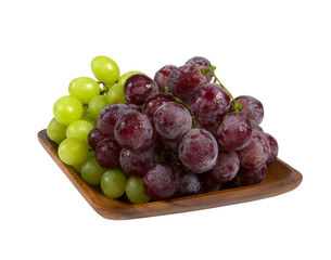 Bunches of black and green grapes
