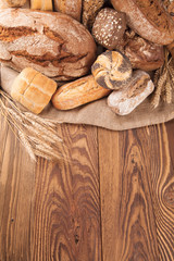 Fresh bread on wood
