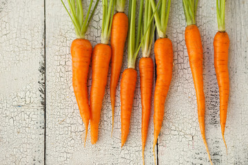 Homegrown carrots on vintage table