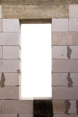 box with a white background a brick wall