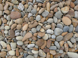 background made of a closeup of a pile of pebbles