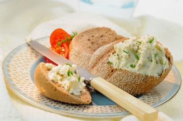 Cream cheese and herbs on bread