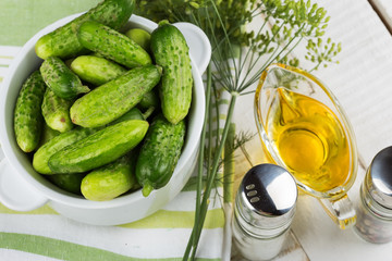 Fresh cucumbers on wooden background