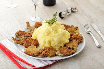Costolette di agnello con purea di patate