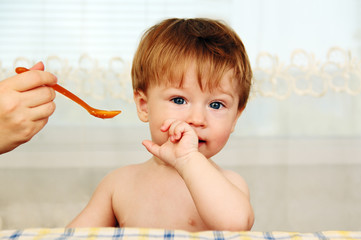 feeding a baby.