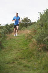 Naklejka premium Man On Run In Countryside