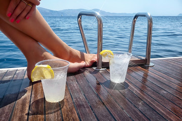 Enjoying drinks on the deck of a sailing yacht in Greece