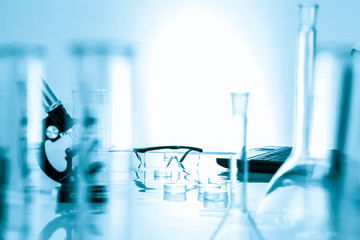 miicroscope and plastic safety glasses in  lab