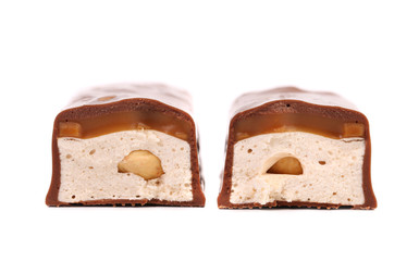 Slices bar of chocolate with filling.