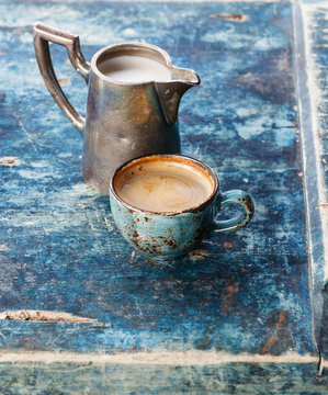 Coffee Cup With Milk On Blue Background