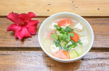 top view asia soup and red flower