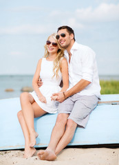 couple in shades at sea side