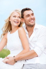 couple in shades at sea side