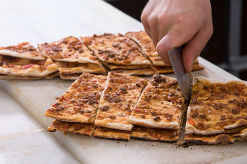 Traditional Turkish pide with chopped meat called lahmacun