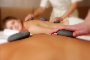 female during luxurious procedure of massage
