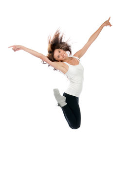Happy modern slim style teenage girl jumping dancing